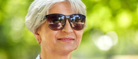 Lady outside wearing sunglasses