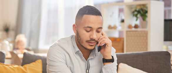 Man on phone counselling