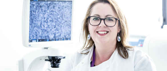 Amanda Carr in lab coat