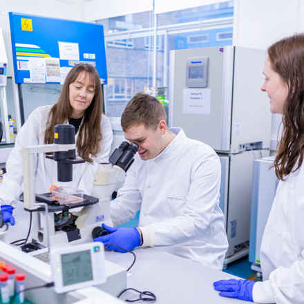 Dr Hill and team in the research lab