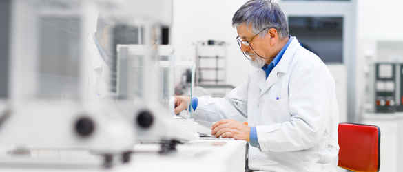 Researcher looking at notes