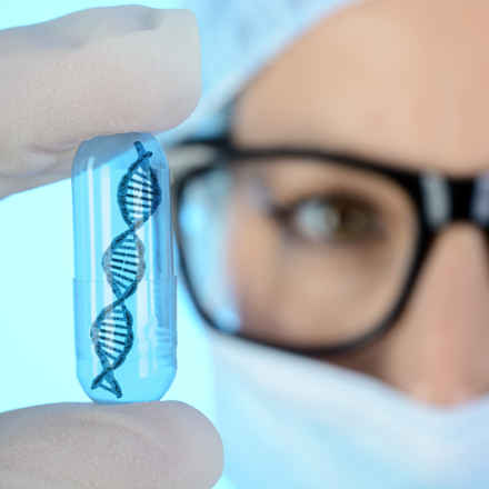 DNA Research, scientist holds up double helix