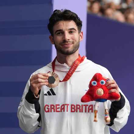 Zac Shaw at Paris 2024 Paralympics with his bronze medal