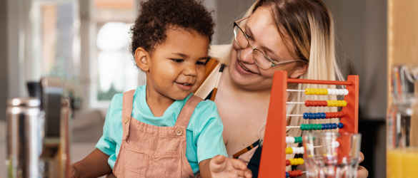 Mother and son playing and smiling